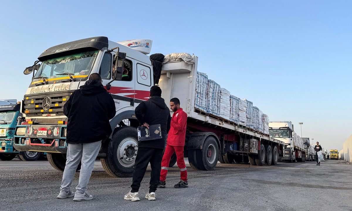Trucks transporting humanitarian aid wait to enter through the Egyptian side of the Rafah border crossing with the Gaza Strip on March 19, 2026. Gaza's border crossing with Egypt reopened on March 19 for a limited number of people, Palestinian and Egyptian officials told AFP, for the first time since Israel and the US launched strikes on Iran. Photo: VCG