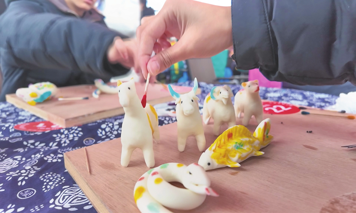 People take part in a rice figurine making competition on March 19, 2026 ahead of the Ganfenshe Festival in Anren county, Central China's Hunan Province. Photos on this page: Courtesy of Anren county's Intangible Cultural Heritage Protection Center