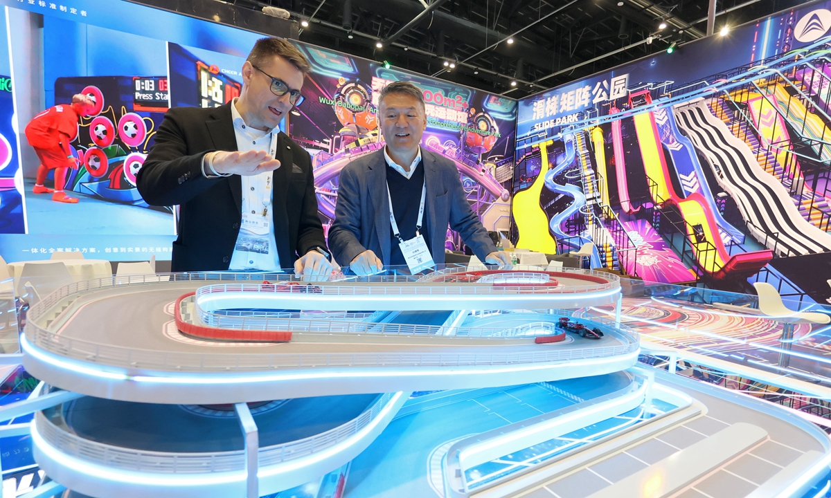 Merchants attend the 2026 China (Beijing) International Amusement Rides and Equipment Expo in Beijing on March 19, 2026. Bringing together more than 600 enterprises from domestic and international supply chains across culture, tourism, leisure and entertainment, the expo serves as an international commercial exchange platform for fostering new quality productive forces in the cultural and entertainment tourism sector and promoting high-quality industrial development. Photo: VCG
