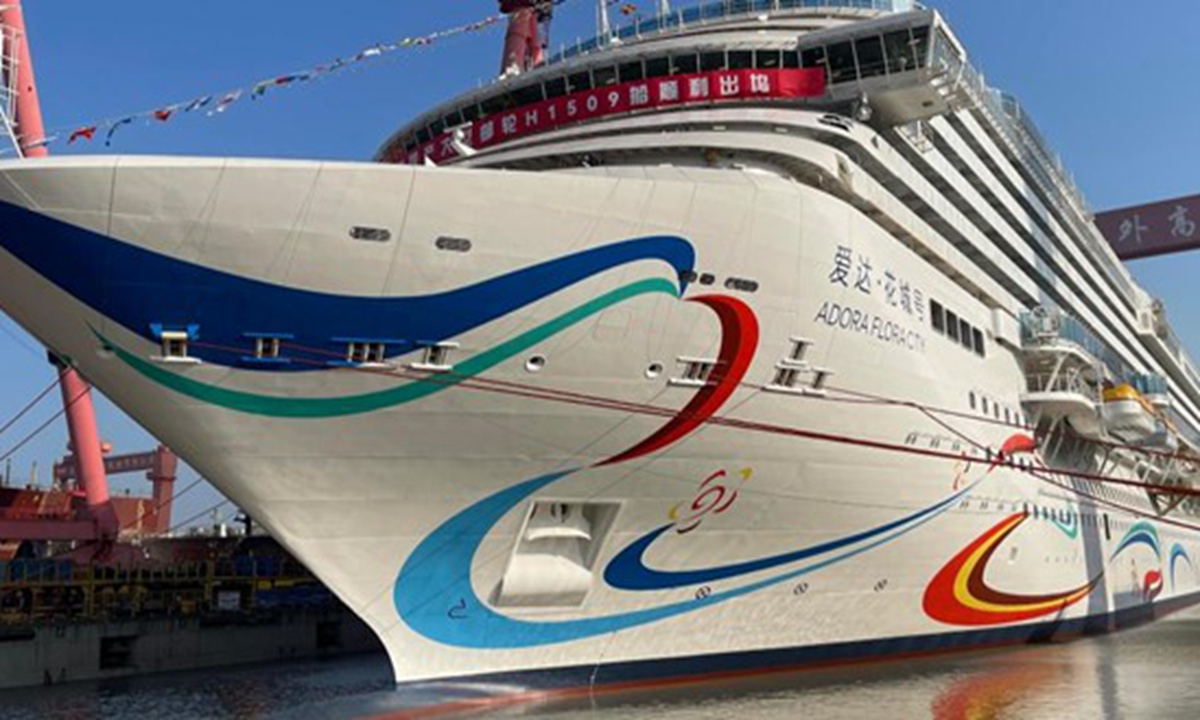 The Adora Flora City, China's second domestically built large cruise ship, is undocked from the construction dock by powerful tugboats at Shanghai Waigaoqiao Shipbuilding Co in Shanghai on March 20, 2026. Photo: Xinhua