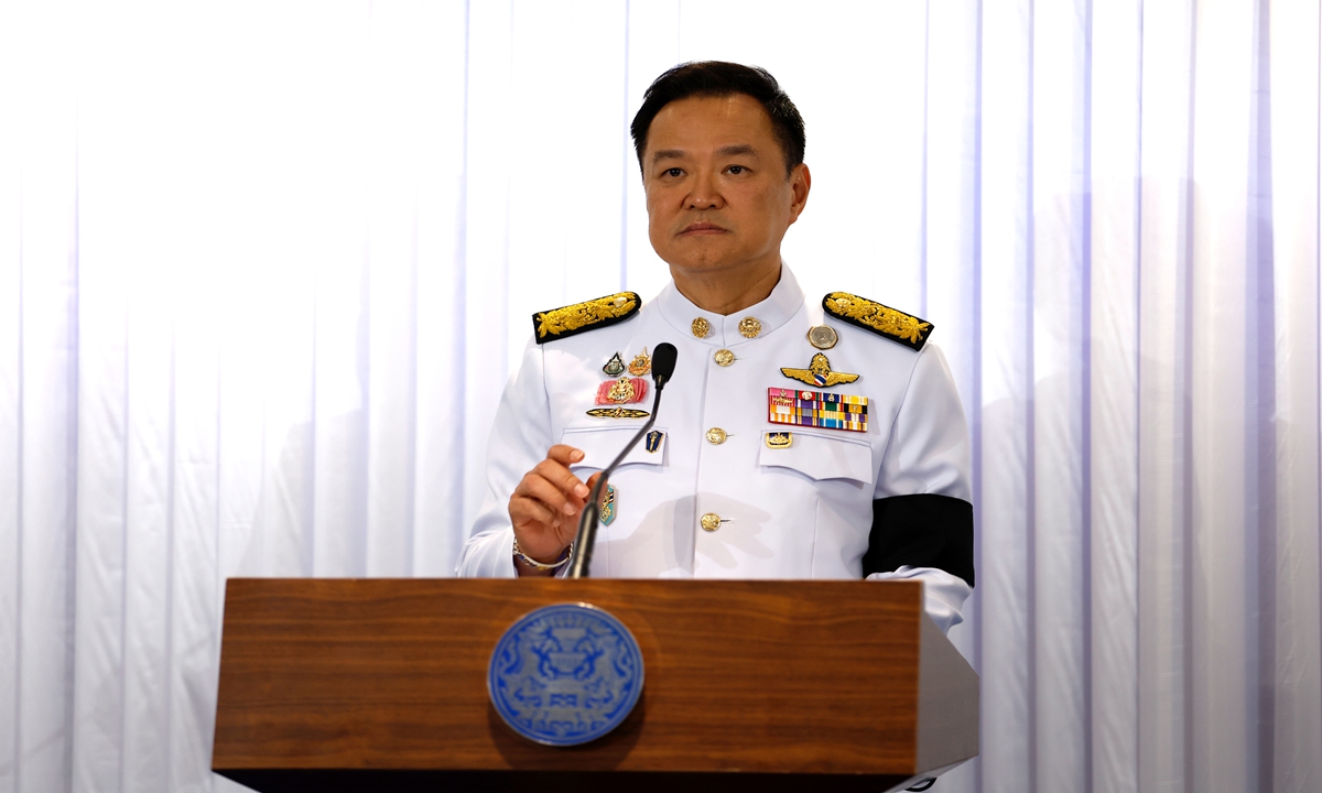 Thai Prime Minister Anutin Charnvirakul adjusts a microphone before speaking to the media at Bhumjaithai Party headquarters in Bangkok, Thailand, on March 20, 2026. Anutin, a candidate from the Bhumjaithai Party, was re-elected Thailand's prime minister after securing a simple majority in a vote cast by the House of Representatives. Anutin pledged to govern with absolute integrity, promising to prioritize the well-being of the Thai people and foster a new, collaborative political atmosphere. Photo: VCG