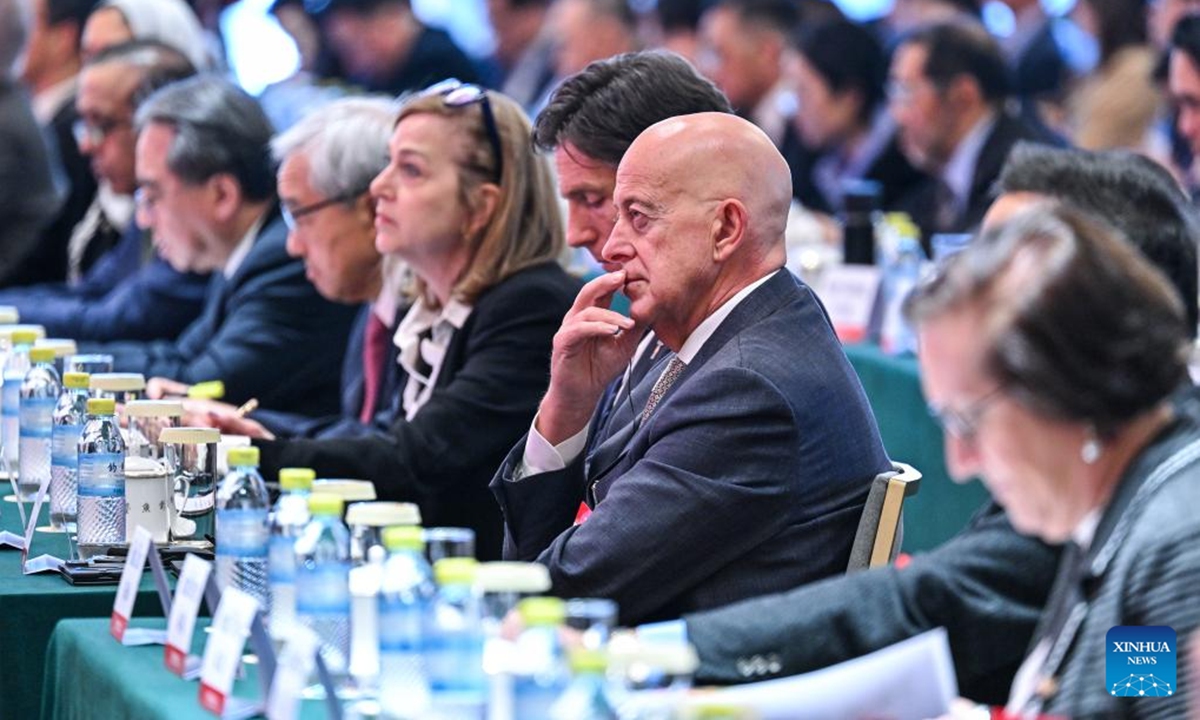 Participants attend the China Development Forum 2026 in Beijing, capital of China, March 22, 2026. The China Development Forum 2026 kicked off in Beijing on Sunday. The theme of this year's forum is China in Its 15th Five-Year Plan Period: Advancing High-Quality Development and Creating New Opportunities Together. (Xinhua/Li Xin)