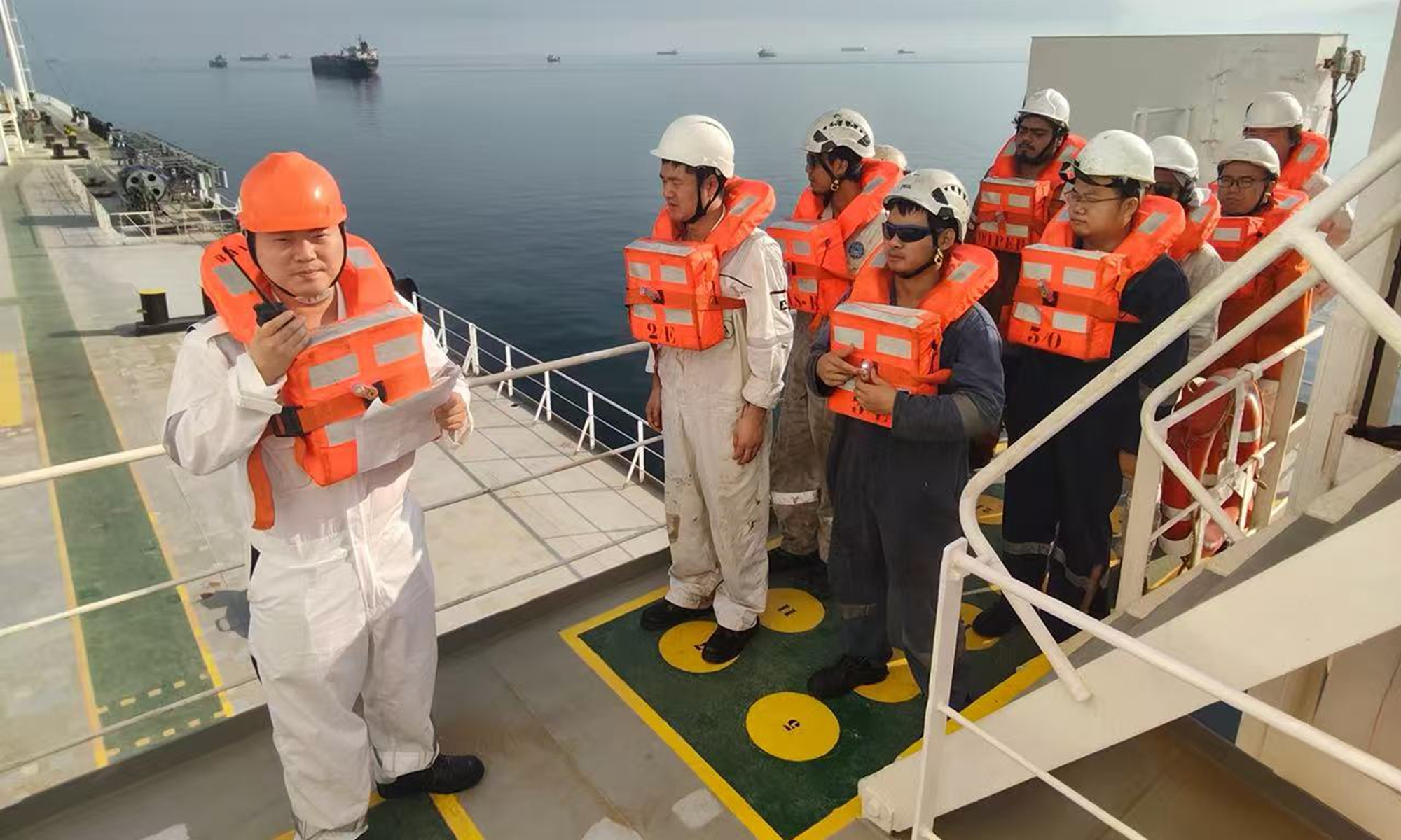 Liu Yiwen (left) and his crewmates conduct a drill in the waters near the Strait of Hormuz on March 15, 2026. Photo: Courtesy of Liu Yiwen