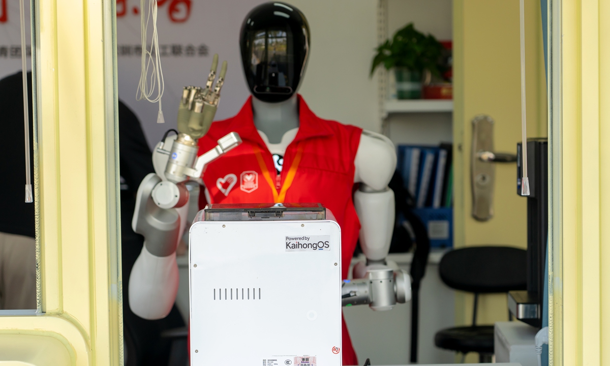 A volunteer service robot in operation at China's first robot volunteer service station in Shenzhen, South China's Guangdong Province on March 23, 2026. It features artificial intelligence interaction, environmental perception, and service functions including information guidance, public convenience, and emergency response. Photo: VCG