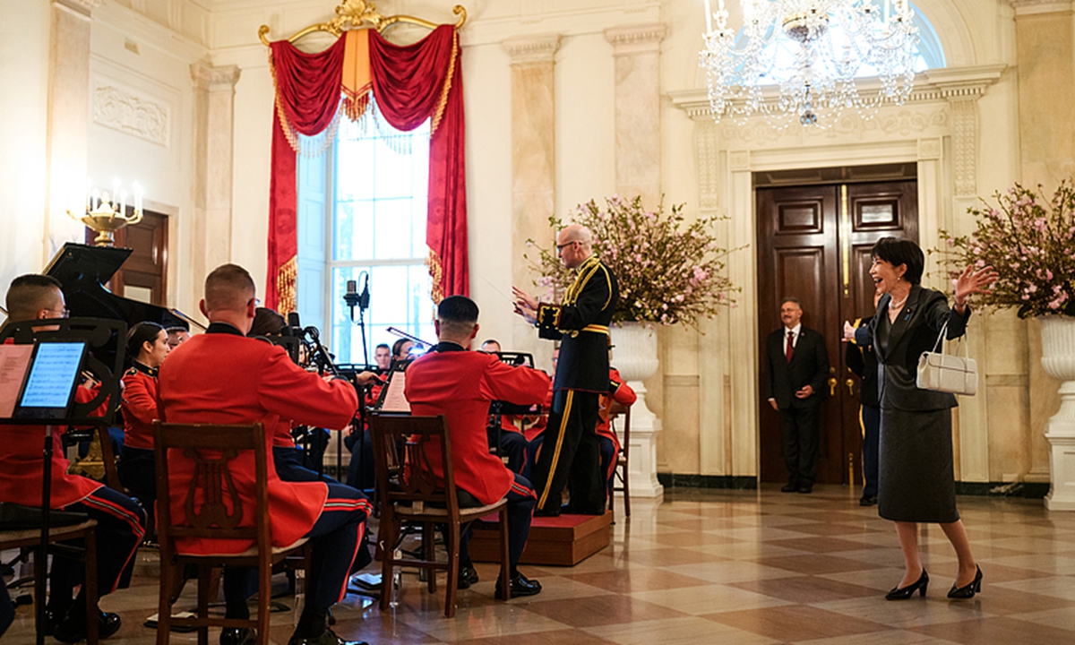 Japanese Prime Minister Sanae Takaichi sings and dances before dinner with President Donald J. Trump in the State Dining Room of the White House, Thursday, March 19, 2026. Photo: VCG