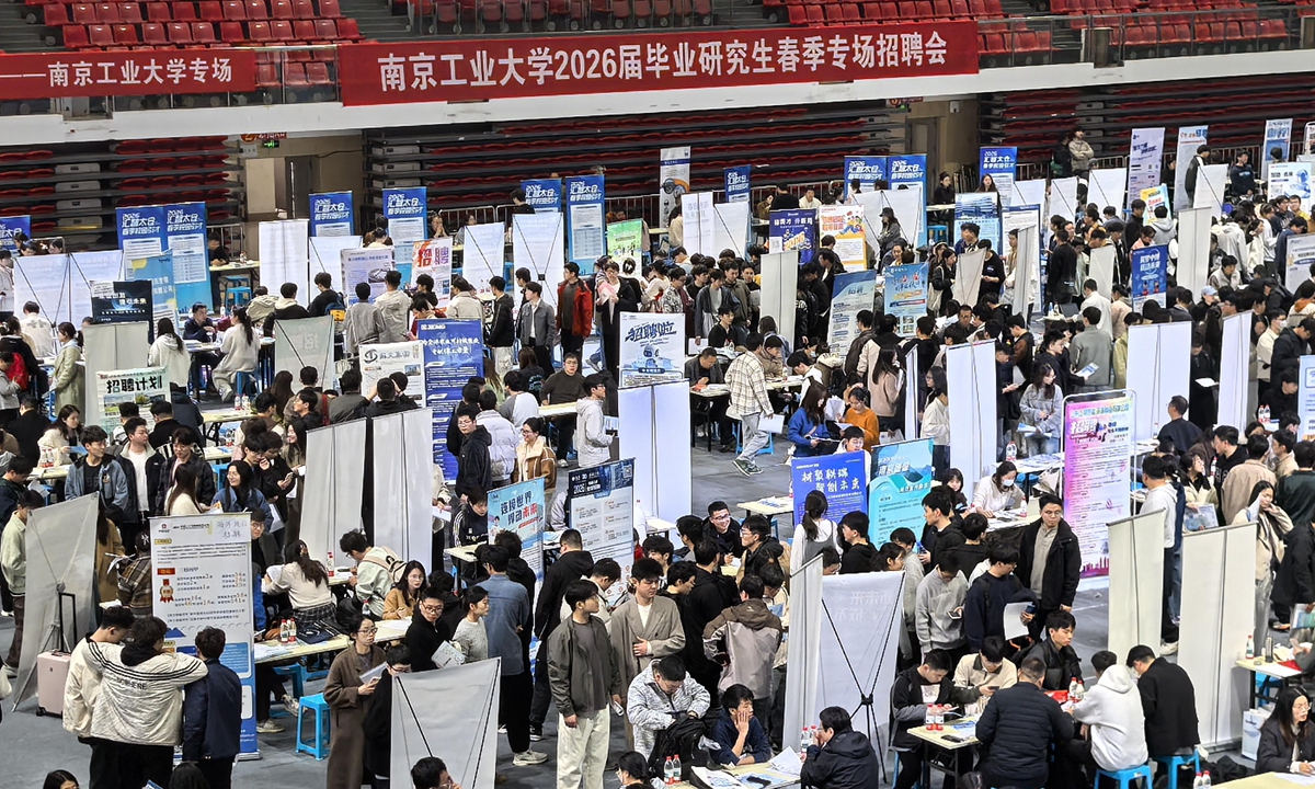 Graduating students attend a job fair at Nanjing Tech University in Nanjing, East China's Jiangsu Province, on March 25, 2026. The university held the special spring job fair to boost high-quality employment for its 2026 graduates. More than 220 enterprises provided over 1,000 job vacancies, drawing a large number of postgraduate students. Photo: VCG