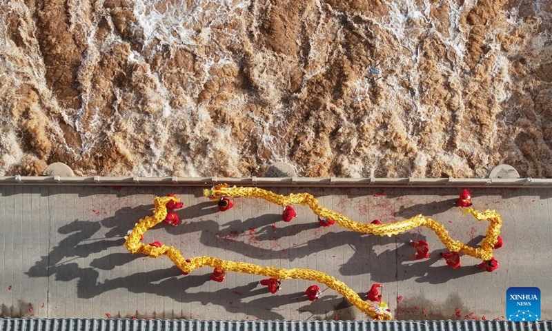 An aerial drone photo taken on March 24, 2026 shows an opened sluice gate diverting water from the Yellow River for irrigation in Qingtongxia, northwest China's Ningxia Hui Autonomous Region. (Xinhua/Wang Peng)

