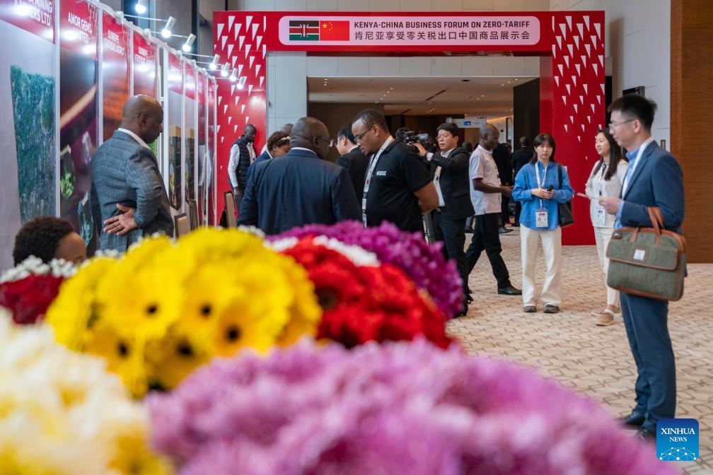 Participants communicate at the exhibition of the China-Kenya Business Forum held in Nairobi, Kenya, March 23, 2026.  (Xinhua/Xie Jianfei)