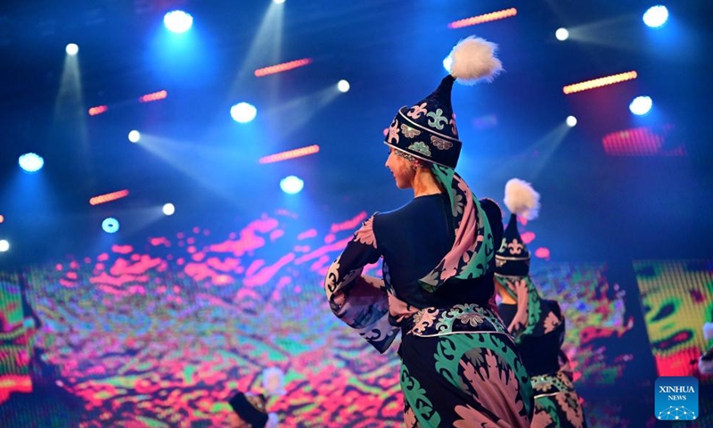 Performers dance during the opening ceremony of the first Youth Delphic Games of the Shanghai Cooperation Organization (SCO) member states in Bishkek, the capital of Kyrgyzstan, on March 24, 2026. The opening ceremony of the first Youth Delphic Games of the Shanghai Cooperation Organization (SCO) member states was held on Tuesday in Bishkek, attended by representatives of the arts from the 10 SCO member countries. (Xinhua/Li Renzi)

