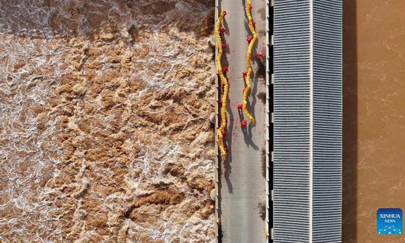 An aerial drone photo taken on March 24, 2026 shows an opened sluice gate diverting water from the Yellow River for irrigation in Qingtongxia, northwest China's Ningxia Hui Autonomous Region. (Xinhua/Wang Peng)

