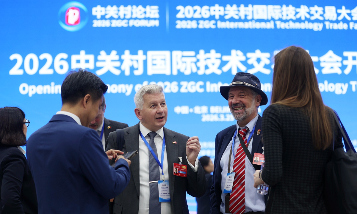 Participants chat at the 2026 Zhongguancun (ZGC) Forum in Beijing, on March 25, 2026. Photo: VCG