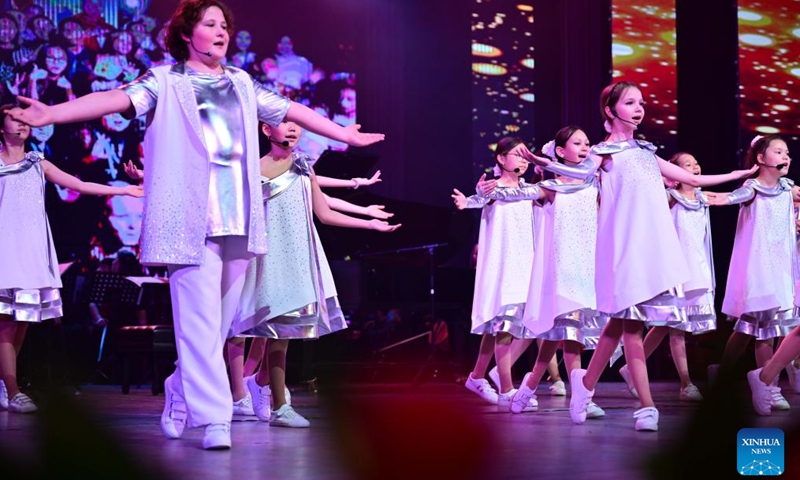Performers dance during the opening ceremony of the first Youth Delphic Games of the Shanghai Cooperation Organization (SCO) member states in Bishkek, the capital of Kyrgyzstan, on March 24, 2026. The opening ceremony of the first Youth Delphic Games of the Shanghai Cooperation Organization (SCO) member states was held on Tuesday in Bishkek, attended by representatives of the arts from the 10 SCO member countries. (Xinhua/Li Renzi)

