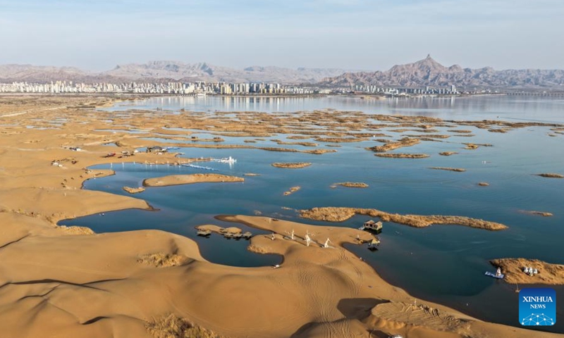 An aerial drone photo taken on March 25, 2026 shows a view of Wuhai Lake in Wuhai City, north China's Inner Mongolia Autonomous Region.

Wuhai Lake, one of Inner Mongolia's major lakes, covers an area of 118 square kilometers. (Xinhua/Lian Zhen)