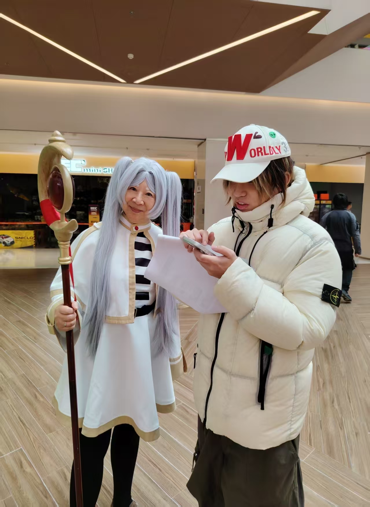 Wang Xuefang (left) wears an anime costume before shooting. Photo: Courtesy of Wang