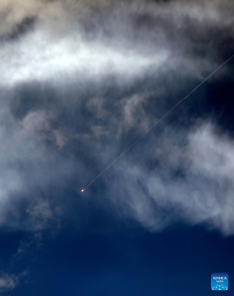 A trail left by a projectile in the sky is seen from the city of Hebron in the West Bank amid regional tensions, March 25, 2026. (Photo by Mamoun Wazwaz/Xinhua)