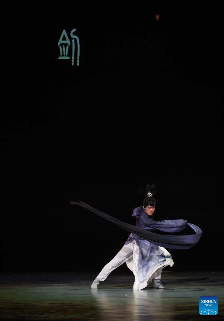 An artist performs during the opening ceremony of the 10th World Junior Wushu Championships in Tianjin, north China, March 25, 2026. (Xinhua/Sun Fanyue)

