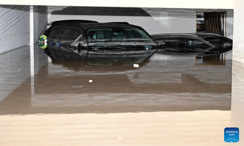 Cars are seen in a flooded basement after heavy rain in Mubarak Al-Kabeer Governorate, Kuwait, March 25, 2026. Heavy rainfall and unstable weather conditions affected several parts of Kuwait on Wednesday. (Photo by Asad/Xinhua)

