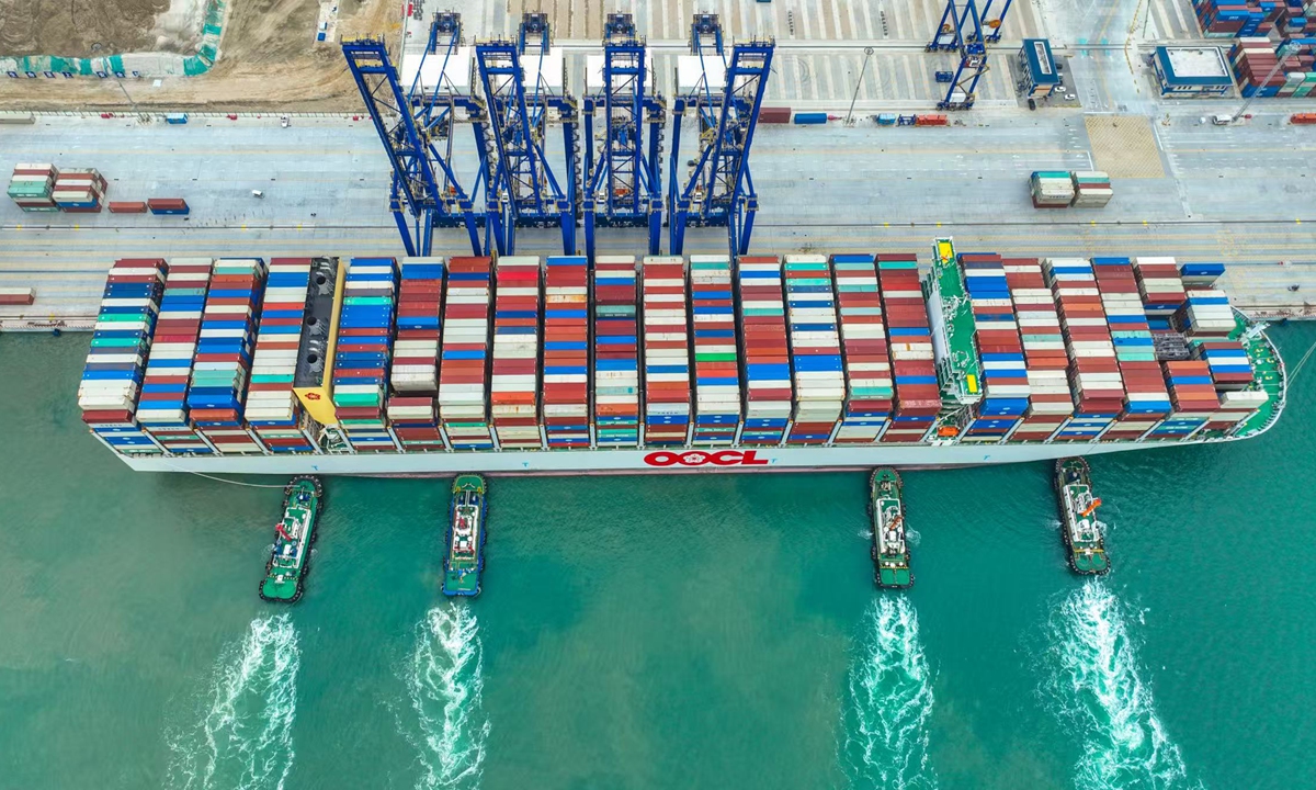 An international navigation vessel loaded with containers docks at Yangpu International Container Terminal in Danzhou, South China's Hainan Province on November 23, 2025. Photo: VCG