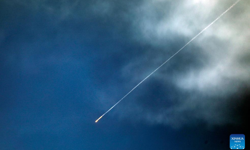A trail left by a projectile in the sky is seen from the city of Hebron in the West Bank amid regional tensions, March 25, 2026. (Photo by Mamoun Wazwaz/Xinhua)