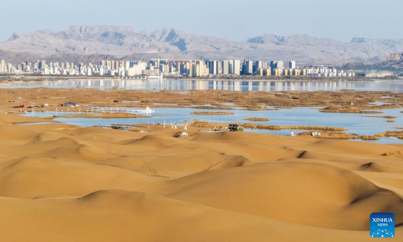 An aerial drone photo taken on March 25, 2026 shows a view of Wuhai Lake in Wuhai City, north China's Inner Mongolia Autonomous Region.

Wuhai Lake, one of Inner Mongolia's major lakes, covers an area of 118 square kilometers. (Xinhua/Lian Zhen)