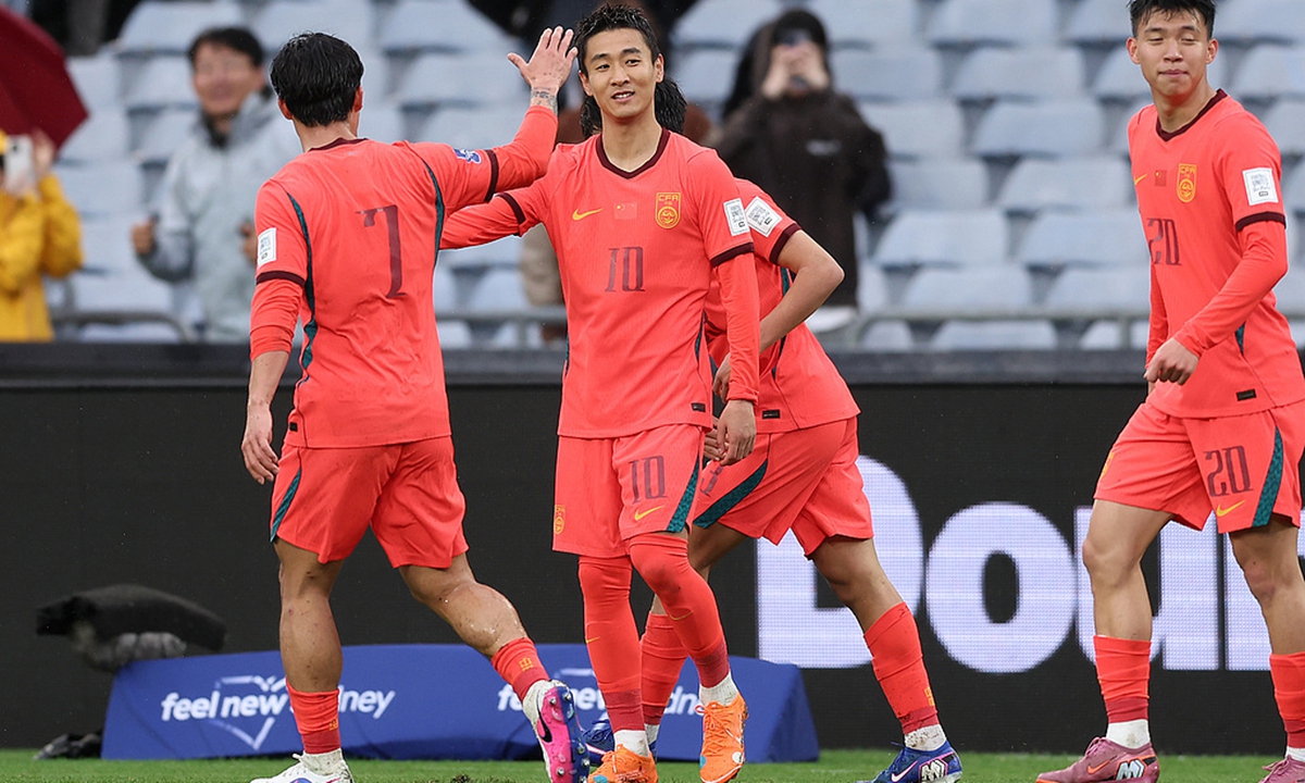 China's Wei Shihao (center) celebrates after scoring the first goal during the game against Curacao on March 27, 2026. Photo: VCG