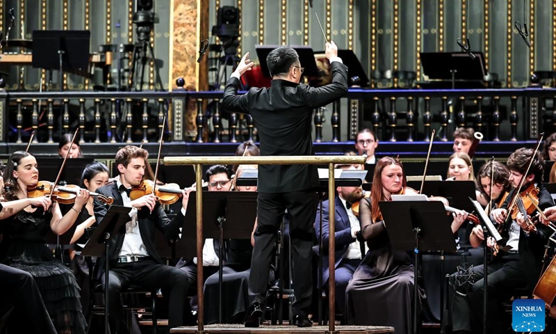 Musicians perform at a China-Hungary cultural exchange concert in Budapest, Hungary, March 25, 2026. The concert, titled TUTTI -- China-Hungary Cultural Exchange Concert, was held on Wednesday evening at the Liszt Academy of Music in Budapest, featuring a joint symphony orchestra of young musicians from the two countries. (Photo by David Balogh/Xinhua)

