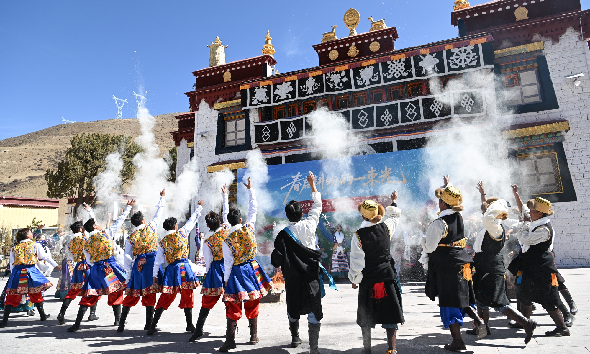People dressed in festive costumes dance to celebrate the annual astronomical observation day at Dapu Astronomical Observatory, which has a history of over 300 years, in Maizhokunggar county, Xizang Autonomous Region, on March 9, 2026.