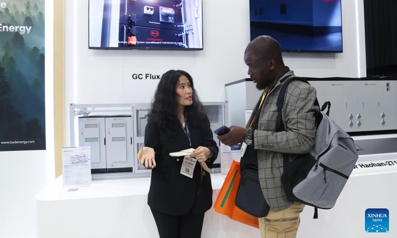 A visitor learns about products at the booth of BYD during the Solar and Storage Live Africa 2026 in Johannesburg, South Africa, March 25, 2026. Chinese renewable energy giants are hogging the spotlight at the ongoing Solar and Storage Live Africa 2026 in Johannesburg, South Africa, highlighting China's growing role in Africa's rapidly expanding clean energy sector. (Xinhua/Chen Wei)