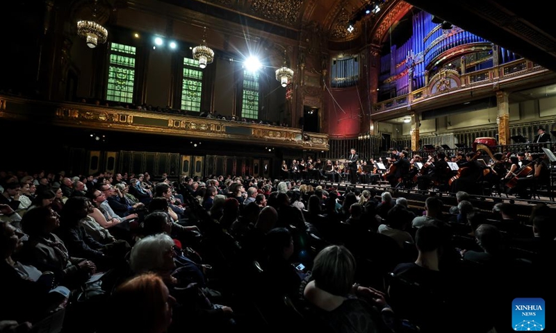 The audience watch a China-Hungary cultural exchange concert in Budapest, Hungary, March 25, 2026. The concert, titled TUTTI -- China-Hungary Cultural Exchange Concert, was held on Wednesday evening at the Liszt Academy of Music in Budapest, featuring a joint symphony orchestra of young musicians from the two countries. (Photo by David Balogh/Xinhua)

