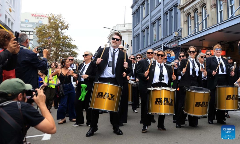 People perform during CubaDupa Festival in Wellington, New Zealand, March 28, 2026. (Photo by Meng Tao/Xinhua)