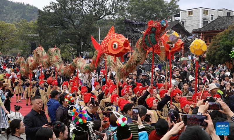 Local people attend the Sama Festival celebration event in Sanbao Dong Village in Rongjiang County, southwest China's Guizhou Province, March 28, 2026. Sama was the name of a heroine in ancient maternal society of Dong people. The Sama Festival, enlisted as one of the national intangible cultural heritages in 2006, is held to commemorate their ancestor. (Photo by Wei Guijin/Xinhua)