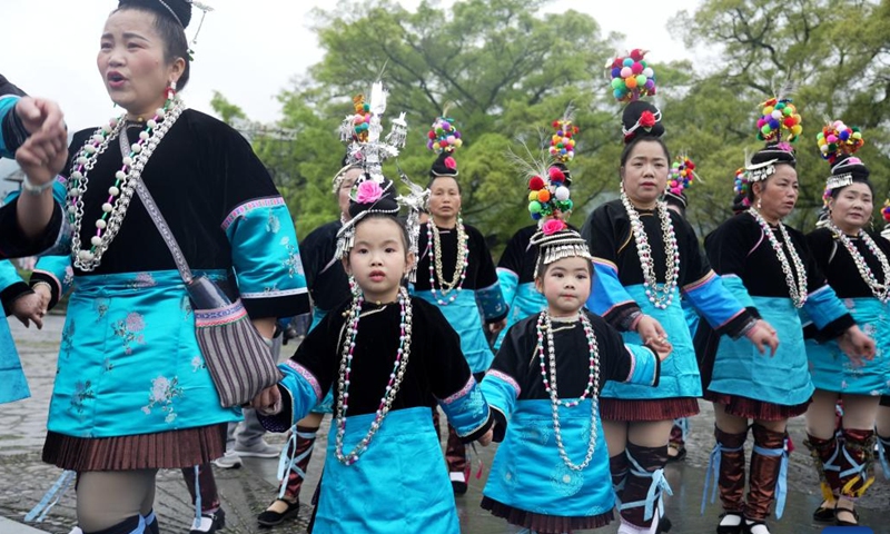 Local people attend the Sama Festival celebration event in Sanbao Dong Village in Rongjiang County, southwest China's Guizhou Province, March 28, 2026. Sama was the name of a heroine in ancient maternal society of Dong people. The Sama Festival, enlisted as one of the national intangible cultural heritages in 2006, is held to commemorate their ancestor. (Photo by Wei Guijin/Xinhua)