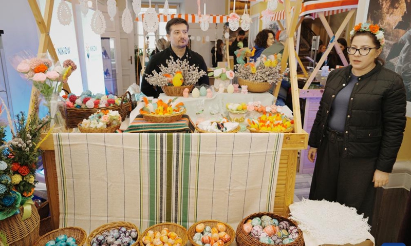 A woman decorates an Easter egg during an Easter fair in Warsaw, Poland, March 28, 2026. Various Polish handicrafts and cultural activities were presented at the event held by the Polish National Institute of Culture and Rural Heritage in Warsaw. (Photo by Jaap Arriens/Xinhua)Easter eggs and festive decorations are displayed at an Easter fair in Warsaw, Poland, March 28, 2026. Various Polish handicrafts and cultural activities were presented at the event held by the Polish National Institute of Culture and Rural Heritage in Warsaw. (Photo by Jaap Arriens/Xinhua)