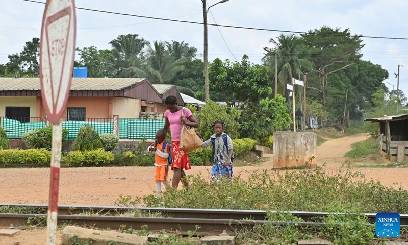 Villagers walk along abandoned railway tracks at Malombo Village, Cameroon, March 27, 2026. (Xinhua/Liu Qiong)