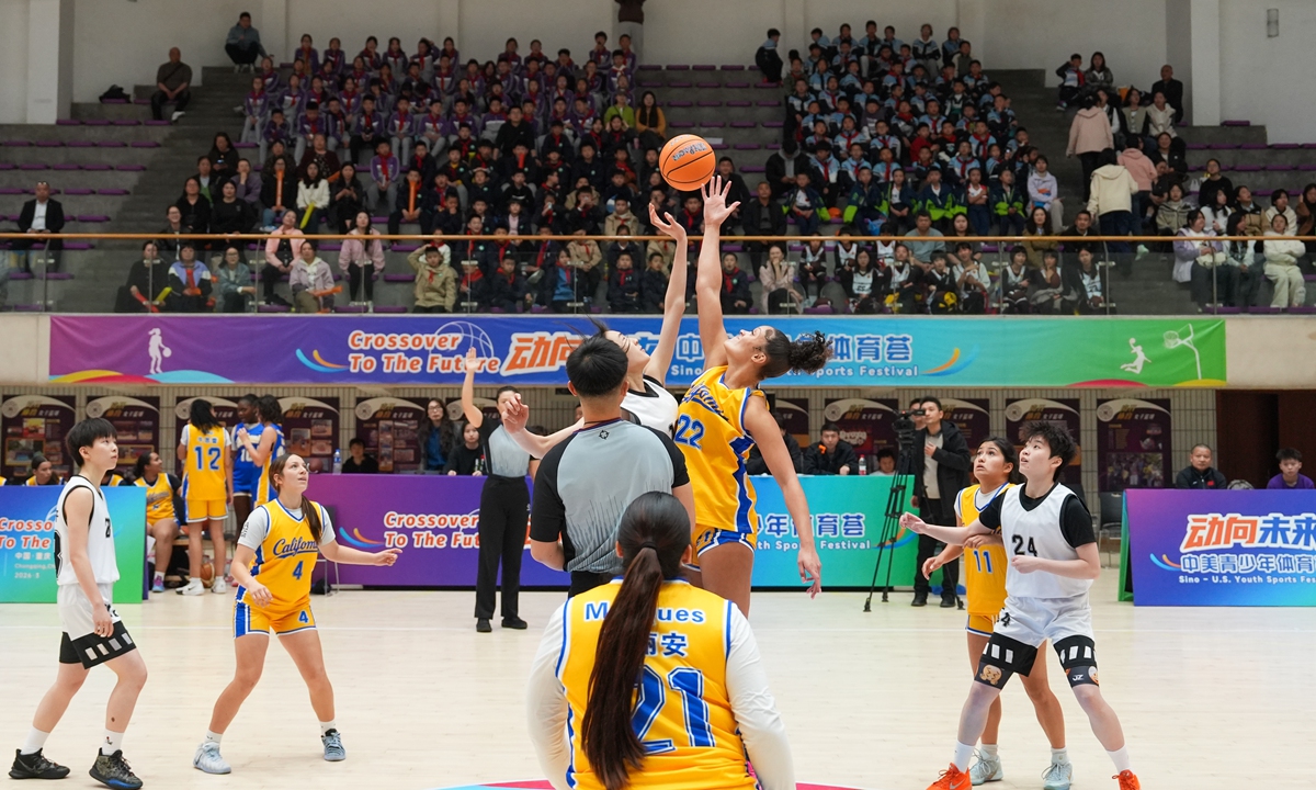 Female basketball players from 10 middle schools in California, the US, play basketball with Chinese students at Chongqing Nankai Middle School in Southwest China's Chongqing on March 30, 2026. The US basketball players and coaches were in the municipality to participate in a China-US Youth sports gala, where they also experienced traditional Chinese folk sports such as shuttlecock kicking, enhancing mutual understanding and deepening friendship through diverse sports exchanges. Photo: VCG