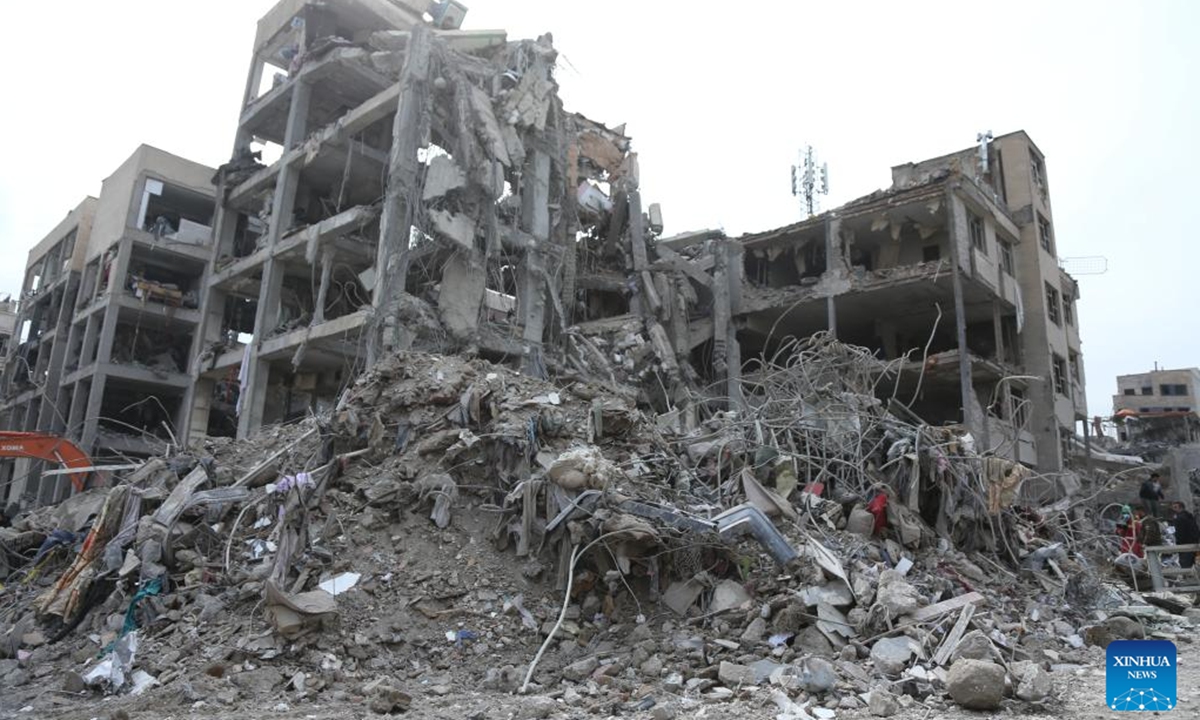 This photo taken on March 12, 2026 shows destroyed houses in Tehran, Iran. The U.S.-Israel-Iran conflict entered its 30th day on Sunday. The Middle East is once again caught in a cycle of escalating violence. Civilian casualties are mounting, regional tensions are intensifying, and the risk of a wider war grows by the day. (Xinhua/Shadati)