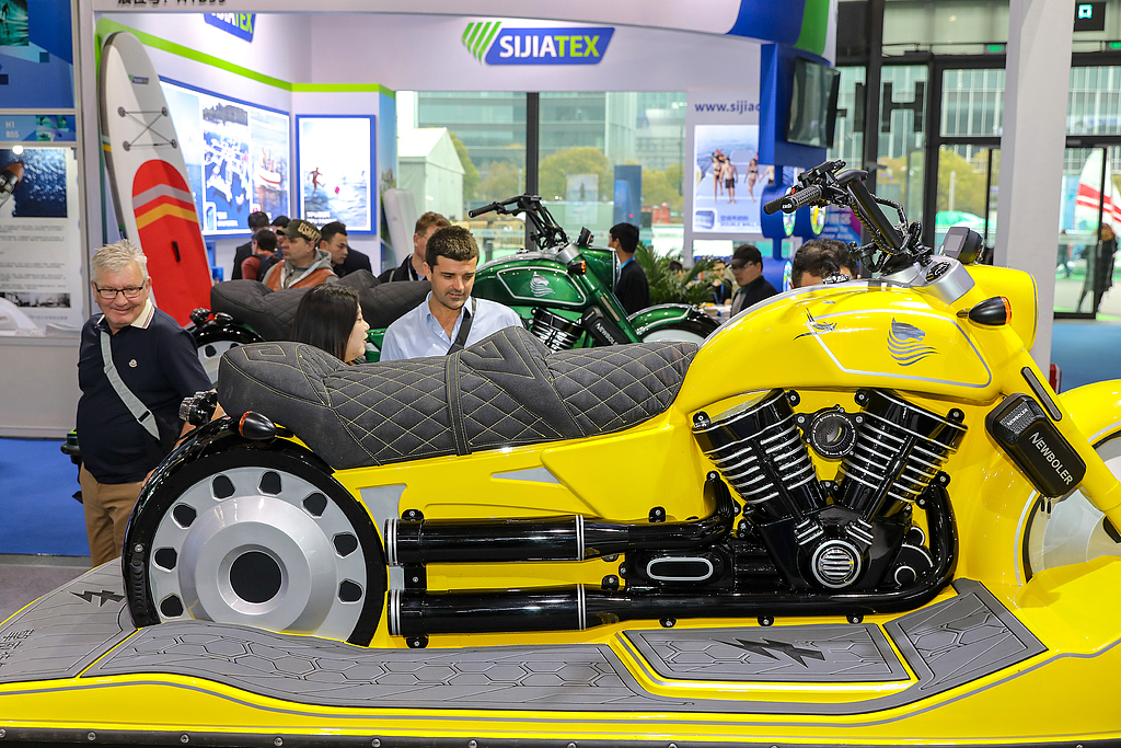 Visitors experience motorboats at the ongoing 29th China (Shanghai) International Boat Show 2026 at the Shanghai World Expo Exhibition & Convention Center in Shanghai, on March 30, 2026. The event is the highest-profile boat show in China, displaying boats, boat equipment and accessories, boat service and water sports. Photo: VCG