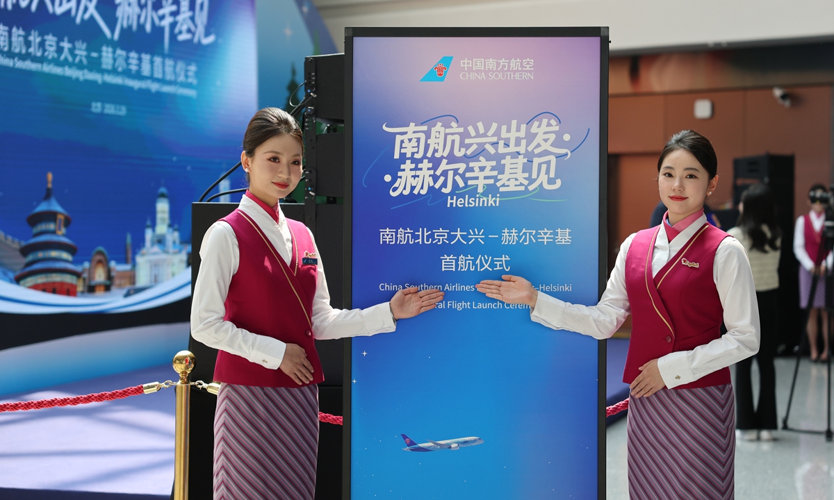 China Southern Airlines flight attendants pose at the inaugural ceremony of the Beijing Daxing-Helsinki route at Beijing Daxing International Airport on March 29, 2026. Photo: China Southern Airlines