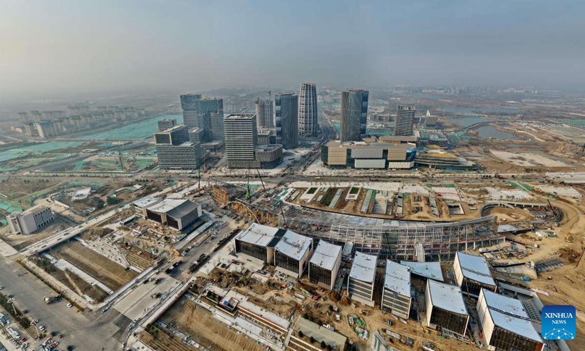 A staff member of China Construction Third Engineering Bureau Group Co., Ltd. works at the construction site of the headquarters of China Mineral Resources Group Ltd. in Xiong'an New Area, north China's Hebei Province, March 25, 2026.(Xinhua/Mu Yu)