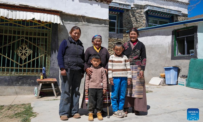 Tsering Sangmo and her family members pose for a group photo at her home in Zongkhar Village of Shannan City, southwest China's Xizang Autonomous Region, March 26, 2026. (Xinhua/Jigme Dorje)