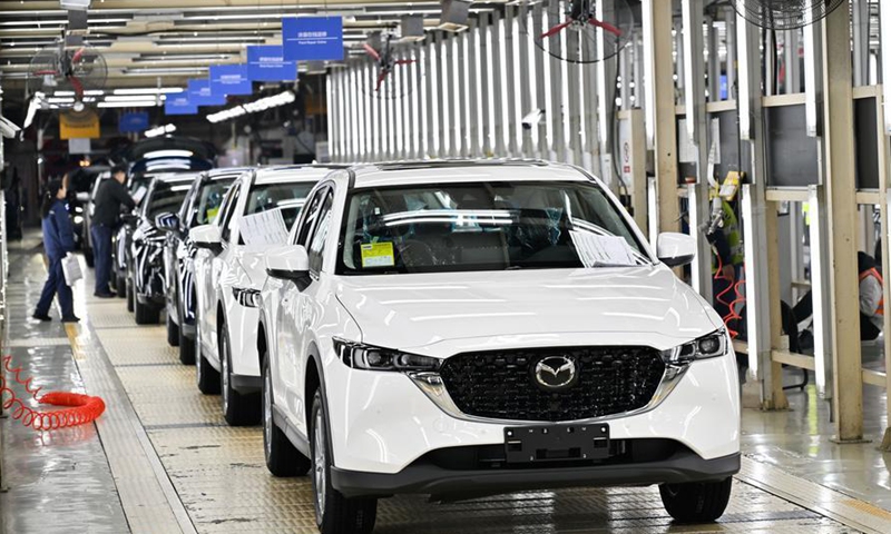 Staff members work on an inspection line at a workshop of Changan Mazda in Nanjing, east China's Jiangsu Province, March 17, 2026.  (Xinhua/Ji Chunpeng)

