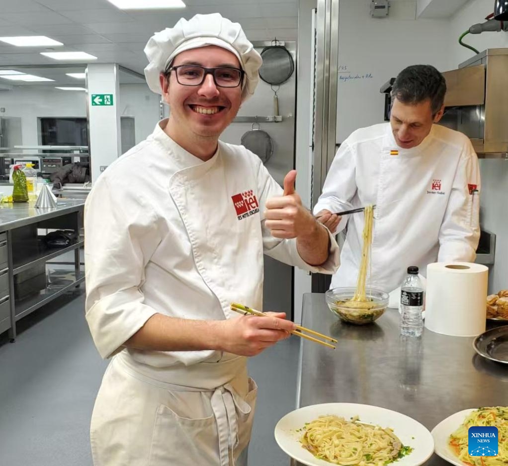 Local vocational students of an international Lamian beef noodle chef training program taste their handmade beef noodles at the I.E.S. Hotel Escuela in Madrid, Spain, in January 2026. (Lanzhou Resource and Environment Vocational and Technical University/Handout via Xinhua)

