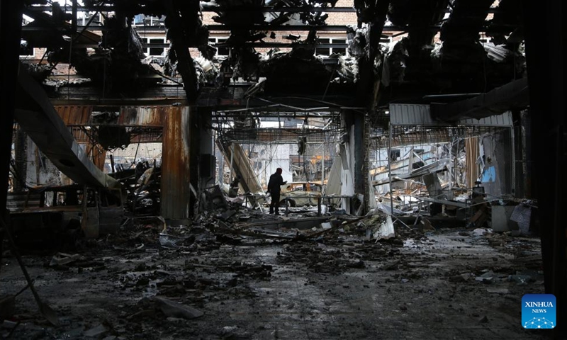 This photo taken on March 28, 2026 shows a car service center after a missile strike in Tehran, Iran. The U.S.-Israel-Iran conflict entered its 30th day on Sunday, with no end to the war in sight. People in Tehran and Tel Aviv spent day and night amid sirens and explosions, facing devastation caused by the conflict while longing for a peaceful life. (Xinhua)