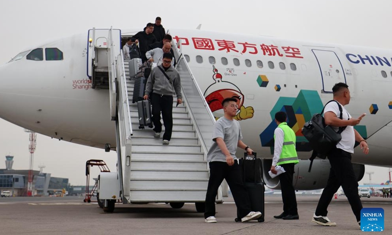 Passengers disembark from the inaugural flight of China Eastern Airlines from Shanghai to Tashkent in Tashkent, Uzbekistan, March 30, 2026.(Photo by Zafar Khalilov/Xinhua)