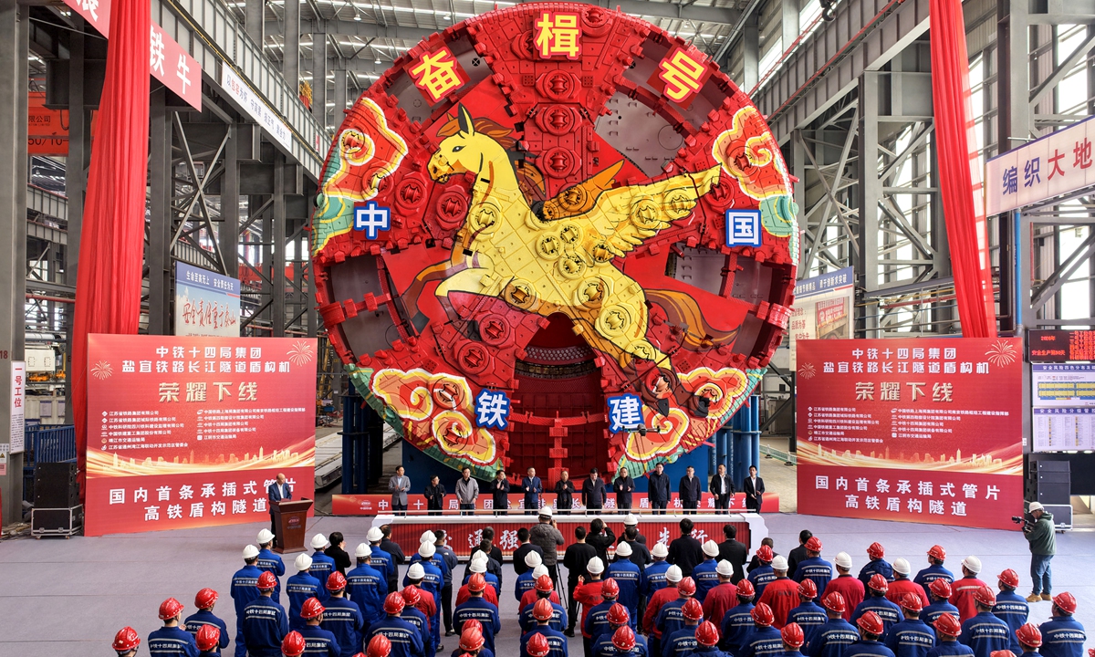 The mega-diameter tunnel boring machine Fenji is launched in Tongzhou Bay Demonstration Zone, Nantong, East China's Jiangsu Province on March 31, 2026. With a total length of 145 meters and a weight of about 3,800 tons, the machine boasts a cutterhead diameter of 14.33 meters and is equipped with multiple intelligent systems, according to media reports. Photo: cnsphoto