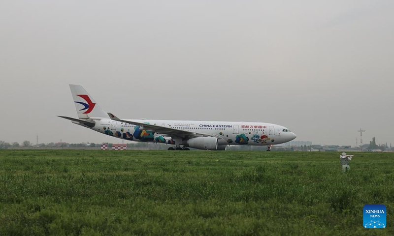 A passenger aircraft of China Eastern Airlines carrying out the inaugural flight from Shanghai to Tashkent lands in Tashkent, Uzbekistan, March 30, 2026. (Photo by Zafar Khalilov/Xinhua)