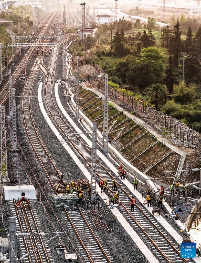 An aerial drone photo taken on March 30, 2026 shows the upgrade project of Lyuyinhu station along the south-to-north extension line of Weng'an-Machangping Railway in southwest China's Guizhou Province.(Xinhua/Yang Wenbin)