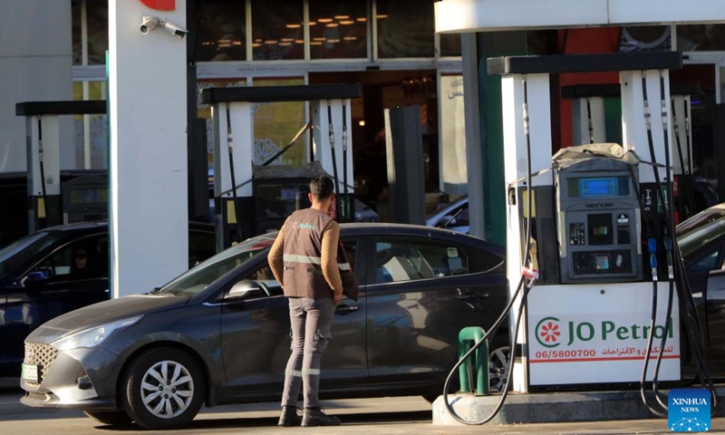 Vehicles refuel at a gas station in Amman, Jordan, on March 31, 2026. Jordan on Tuesday raised fuel prices for April, its first increase since the regional conflict began, while absorbing part of the global price hike to limit the impact on consumers, according to the Jordanian Ministry of Energy and Mineral Resources. (Photo by Mohammad Abu Ghosh/Xinhua)

