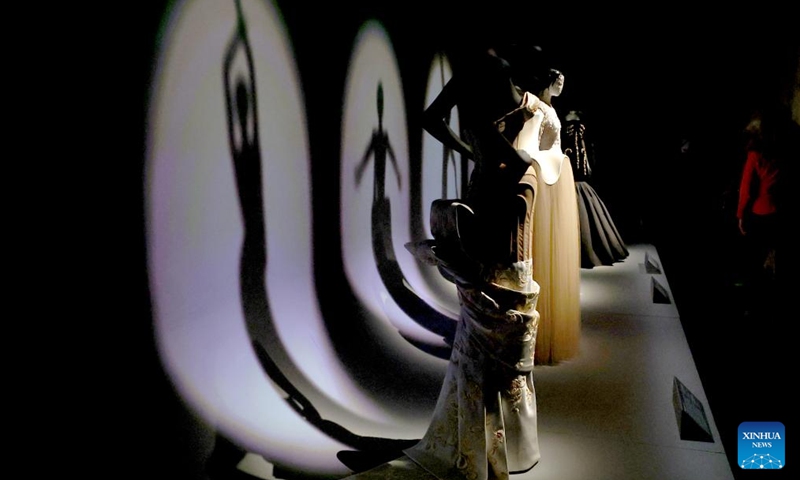 Photo taken on March 30, 2026 shows garments on display at the Schiaparelli: Fashion Becomes Art exhibition at the Victoria and Albert Museum (V&A) in London, Britain. (Xinhua/Li Ying)

