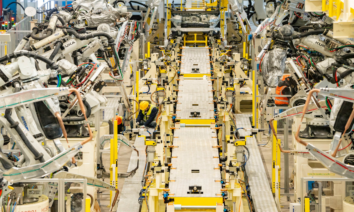 Technicians debug robots installed on the new production line at a welding workshop in Yiwu, East China's Zhejiang Province, on February 25, 2026. Photo: VCG